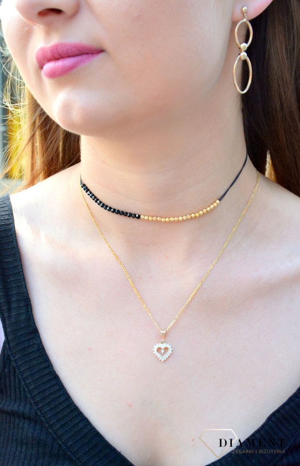 Złota zawieszka 333 serce z cyrkonią ZA 4651 333. Romantyczny wzór, który nada uroku oraz kobiecości każdej stylizacji. Wyjątkowy wisiorek o ponadczasowym motywie zachwyca estetyczną formą wykonania.jpg